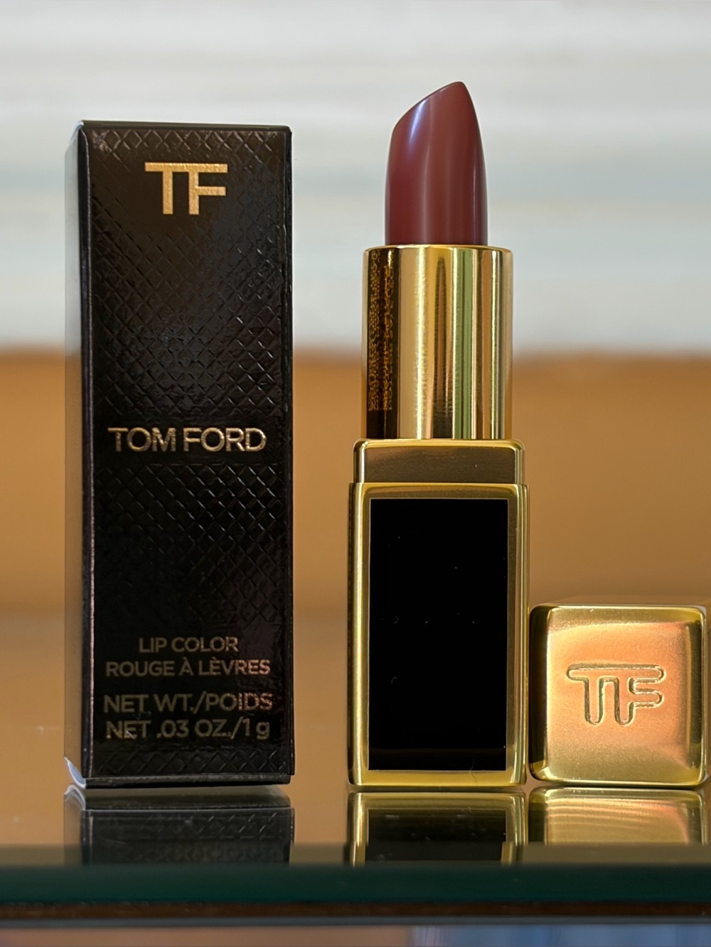 NWT Tom Ford mini size lipstick: N3 West Coast
Clutch size